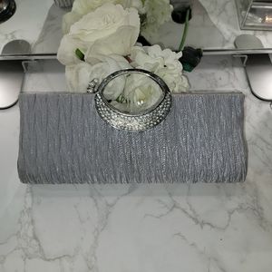Silver clutch with bling handle